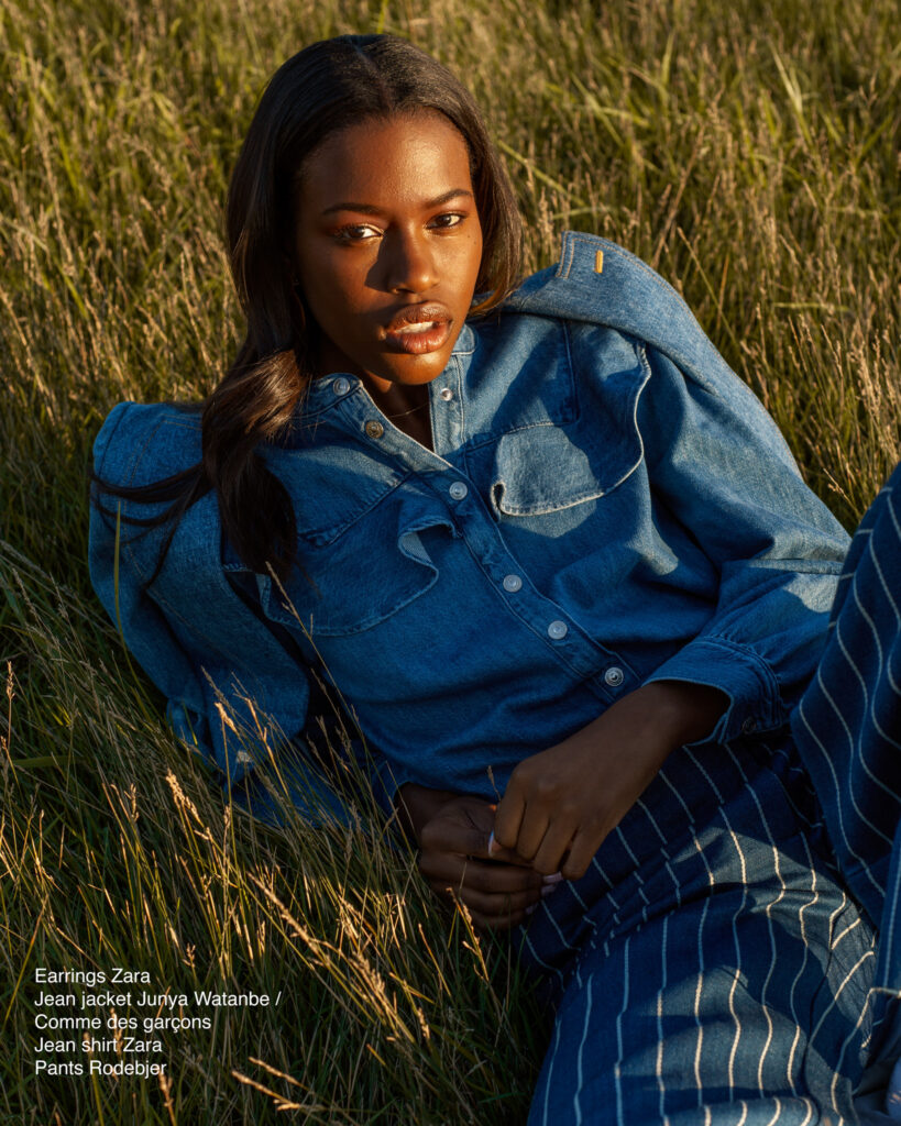 model Naomy Bobe in a field shot by fashion photographer Megane Brunette in Montreal, QC