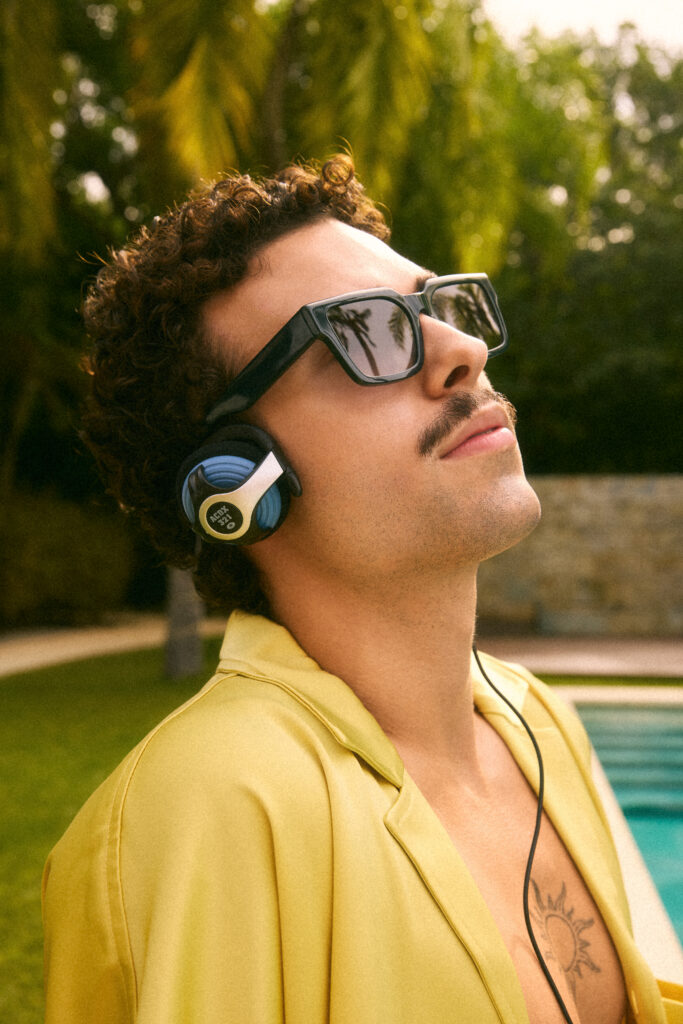 In a SS26 photoshoot for eyewear company Bonlook, model Gabriel Lebleu of Humankind Management sitting by a pool in Mexico. Styled by Gabriel Dupuis, hair and makeup by Mayillah, photographed by Megane Brunette.